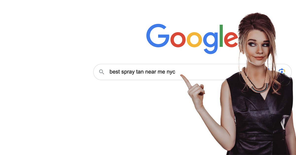 A woman with a beehive hairstyle and dark makeup is pointing to the left with her index finger. She is wearing a black sleeveless dress and a necklace, looking ready for her professional mobile spray tan session. The background is plain white.